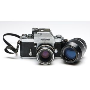 A Nikon F camera with two lenses Nikon model 6410383, lenses…