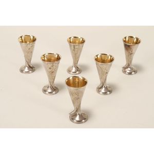 Set of six Latvian silver kiddush cups, with conical bowls with…