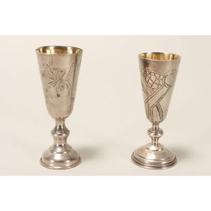 Two Latvia silver kiddush cups, with narrow tapering bowls, on…