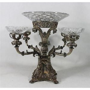 A George IV silver table centrepiece with four crystal dishes…