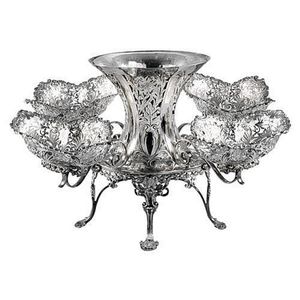 A Georgian style silver centrepiece, the central vase double…