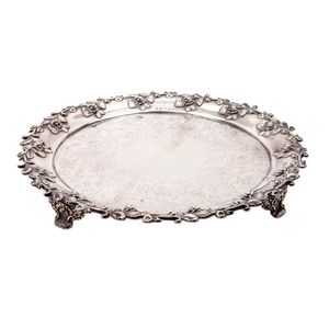 An early Victorian sterling-silver salver with ornate floral…