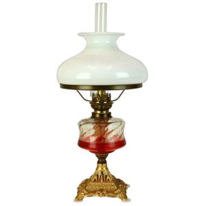 A gilt metal oil lamp with white glass shade, 20th century,&hellip;