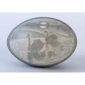 A carved emu egg with swans and cygnets, 19th century, 12.5 cm…