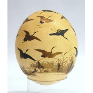 An exquisitely painted ostrich egg, painted with flying cranes…