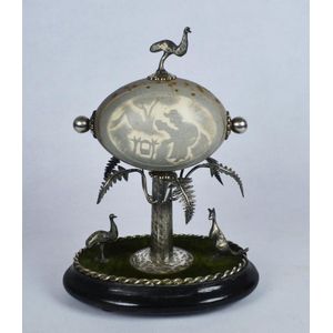 19th century carved Australian emu egg on stand mounted on…