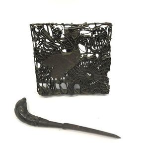 A copper Printing block with a bird and Foliage and a betel nut…