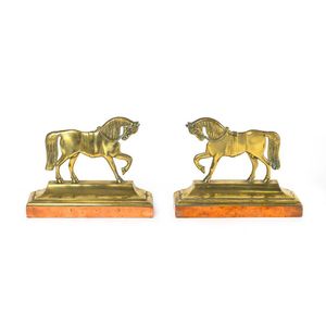 A pair of copper and brass horse-form door stops English, 19th…