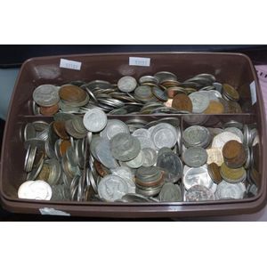 Large plastic container of vintage foreign coins including…
