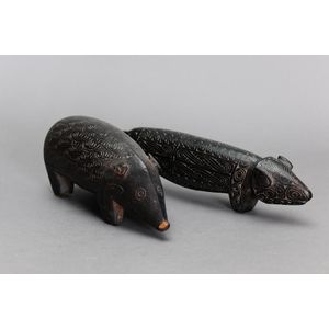 Fine pair of Massim pig figures, Trobriand Islands, Papua New…