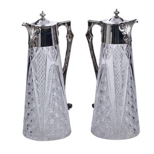 A pair of Victorian silver mounted claret jugs, maker's mark of…