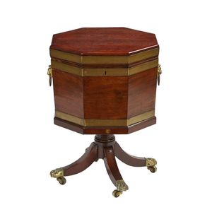 A George III mahogany octagonal cellarette, the rising top&hellip;
