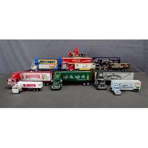 Twelve large scale Matchbox articulated Trucks. Including Jim…
