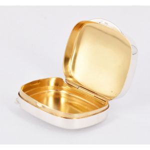 A sterling silver pill box, gilt interior. 4.5 x 3.5 x 5 cm.…