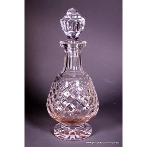A Waterford decanter, of tapering form with a slice cut neck to…