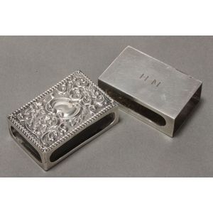 Two Edwardian sterling silver match box holders, of rectangular…