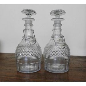 A pair of mallet shaped cut crystal decanters, English, 19th…