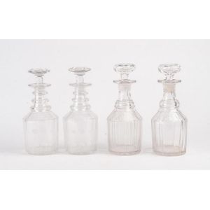 Two pairs of Regency mallet shaped cut glass decanters, 19th…