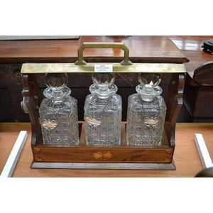 English tantalus with crystal decanters & spirit labels, approx…