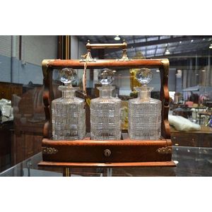 Antique three bottle tantalus, includes key, approx 36 cm high,…