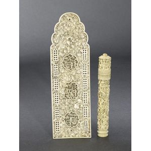 A carved ivory cribbage board, 19th century with barbed figure…