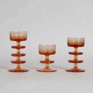 Three topaz Sheringham glass candlesticks, designed by Ronald…