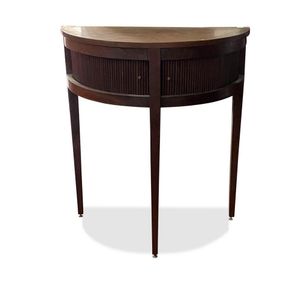 Demi lune drum table, the demi lune top set with two lower…