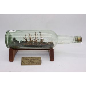 Vintage ship in a bottle, hand made and painted model of a ship