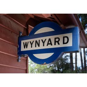 Wynyard double sided station sign. Porcelain enamel right angle…