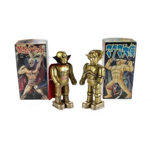 2 Japanese Manga clockwork tinplate and hard plastic headed…