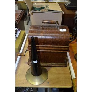 Edison standard phonograph with a box of Amberol cylinders. In…