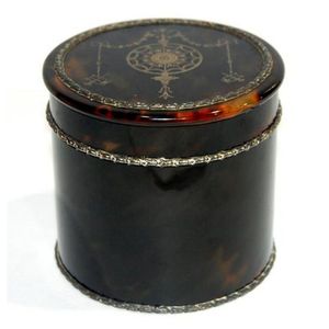 A fine Victorian tortoiseshell circular box inlaid with silver,…
