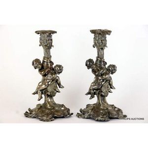A pair of Victorian silver plated bronze candlesticks, 19th…