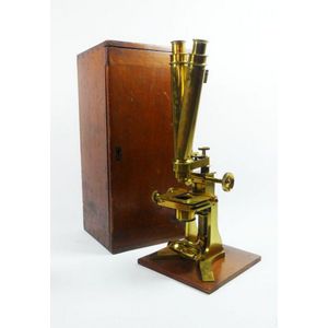 Brass microscope. C. 1900. Having a classical form this…