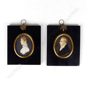 A pair of George III hand painted portrait miniatures, finely…