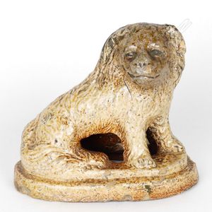 An New Zealand colonial pottery salt glazed dog doorstop, the…