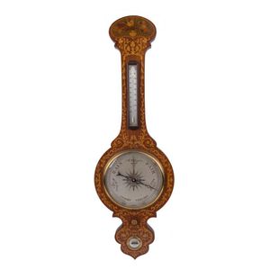 A vintage wall barometer with marquetry finish, 20th century,…