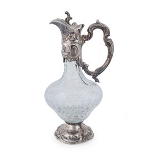 An English claret jug, cut crystal with silver plated marks,…
