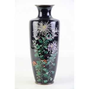 A Japanese cloisonne vase with black field on a floral motif,…