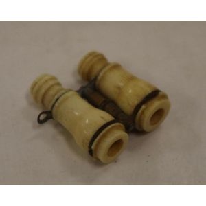 Antique miniature bone binoculars with stanhope view of naked…
