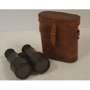 Pair of vintage French binoculars, in original leather case