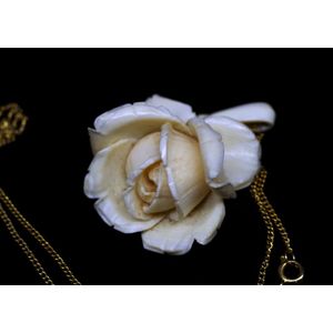 Mid century carved ivory rose pendant 