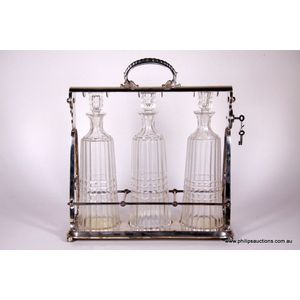 A WMF silver plated tantalus, early 20th century, with tapering…