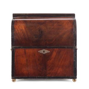 A Georgian mahogany cased six bottle tantalus, circa 1810, with…