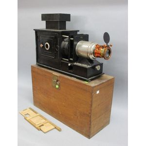 Cased vintage French magic lantern projector, 62 cm x 41 cm x…