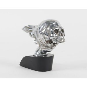 Skull car mascot, chrome on later ebonized timber base, circa…
