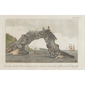 View of an arched rock on the coast of New Zealand with a place…