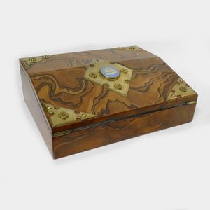 A 19th century walnut writing slope, with enhanced figured…