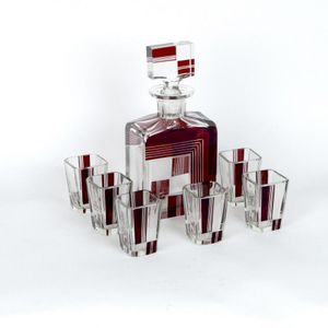 An Art Deco Czech crystal decanter and six glasses, decorated…