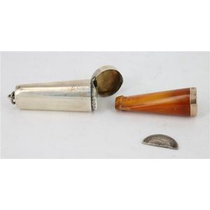 A silver Cheroot case with a Bakelite and 9ct gold rimmed…